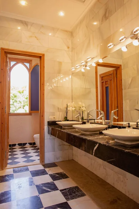 The double vanity bathroom in polished marble