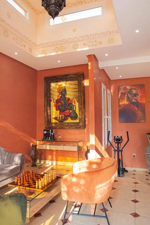 The wood-burning fireplace corner of the salon