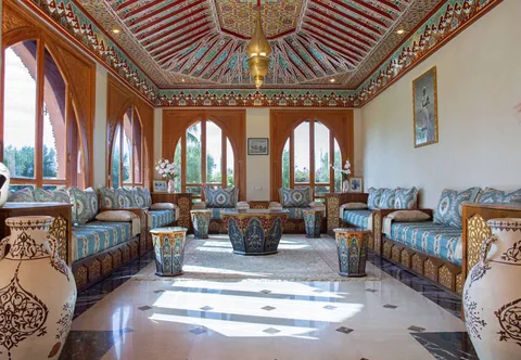 Traditional zouak painted ceiling above the Moroccan seating room