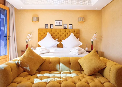 The gold suite seen in full, opening to the terrace