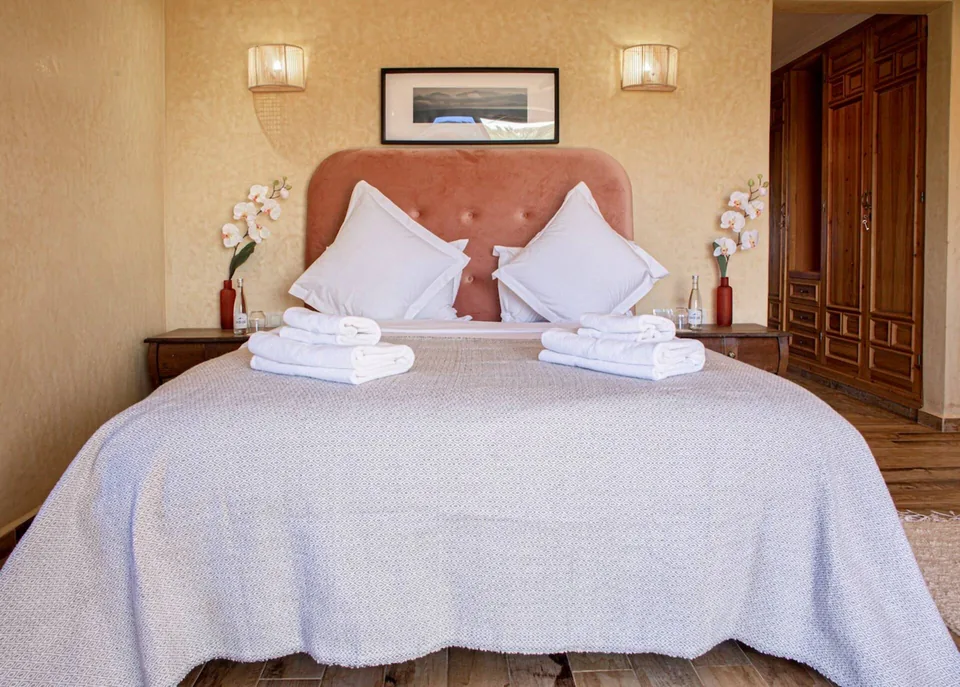 The rose suite with cedar wardrobes and white linen